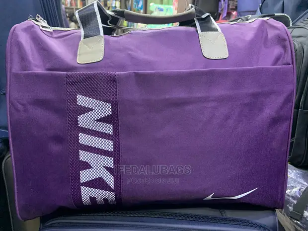 Medium Size Nike Carry on Traveling Luggage in Utako Bags