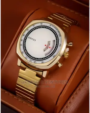 Photo - Gucci Gold Chain Watch