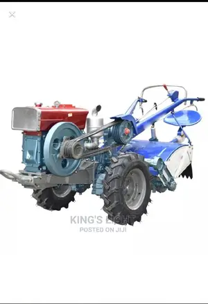 Photo - 18hp Power Tiller With Rotaary Lmplements.