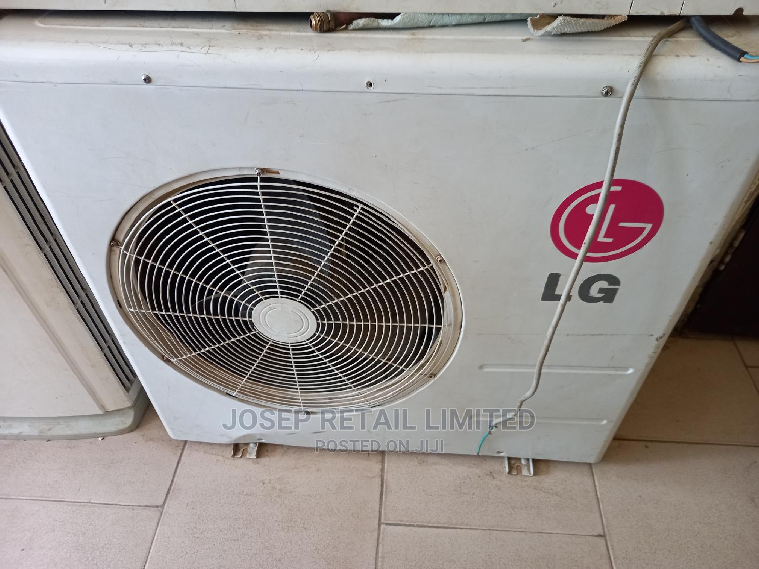 Promo!! Red 3HP Korean LG Whisen Standing Low Energy Ac. in Ibadan